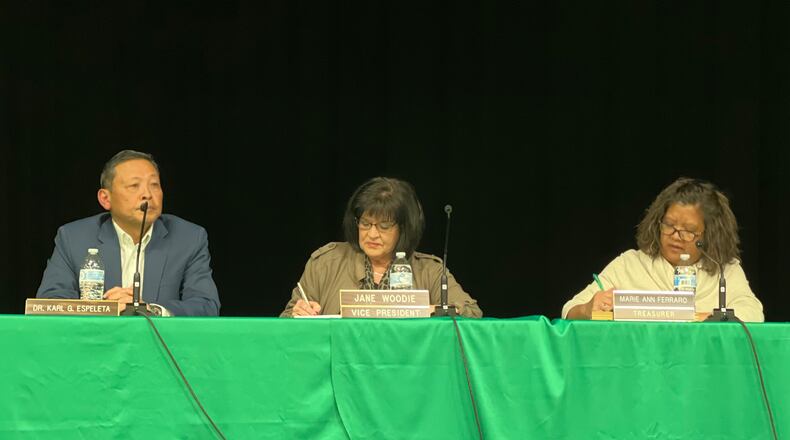Northmont school board member Karl Espeleta, vice president Jane Woodie, and treasurer Ann Ferraro. AIMEE HANCOCK/STAFF