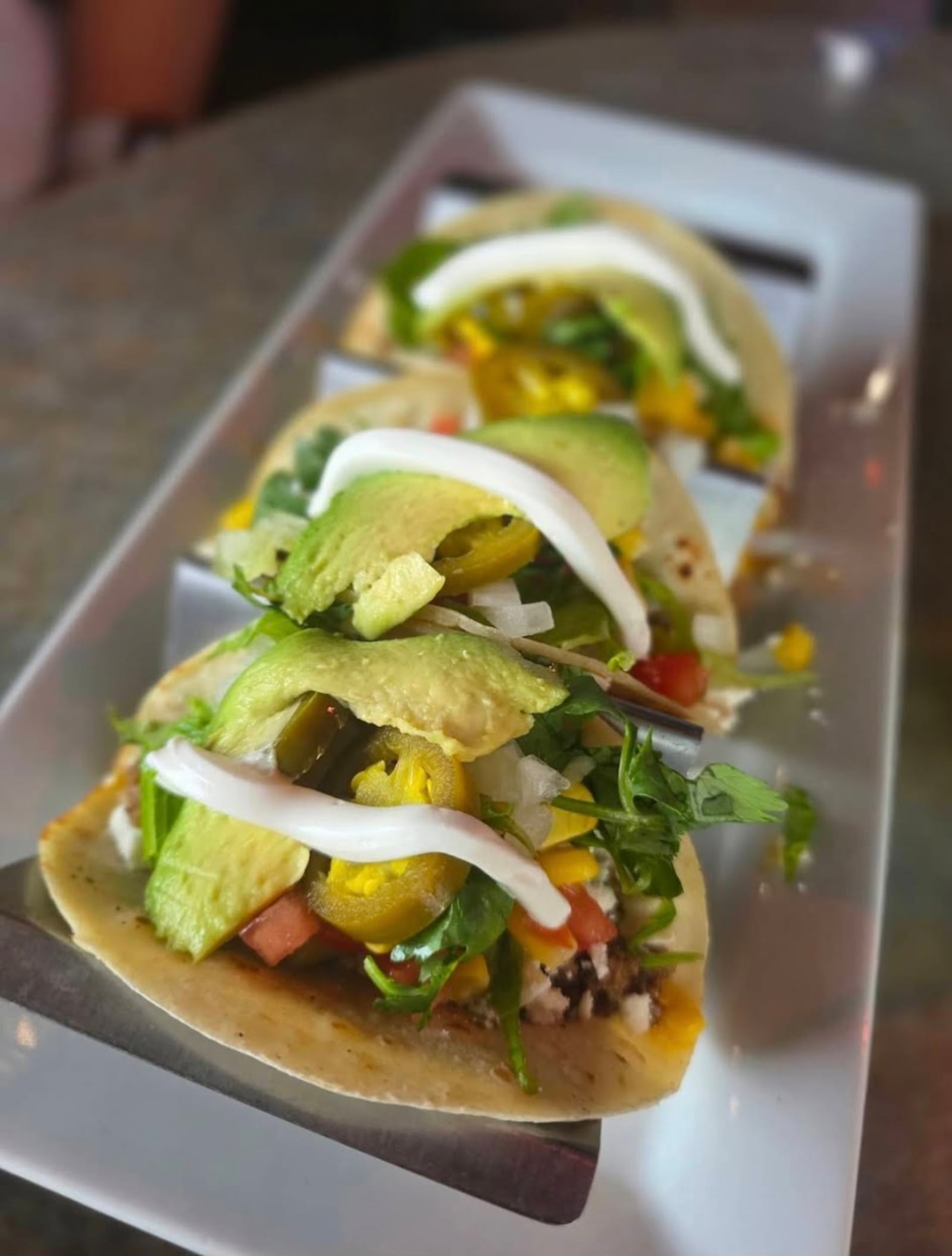 Tradewind Tacos feature bold Latin flavors and fresh ingredients, a popular menu item at Latin Arepas Café. ABRAHAM GUERRA/CONTRIBUTED