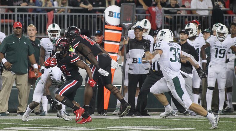 Ohio State's K.J. Hill runs after a catch against Michigan State on Saturday, Oct. 5, 2019, at Ohio Stadium in Columbus.