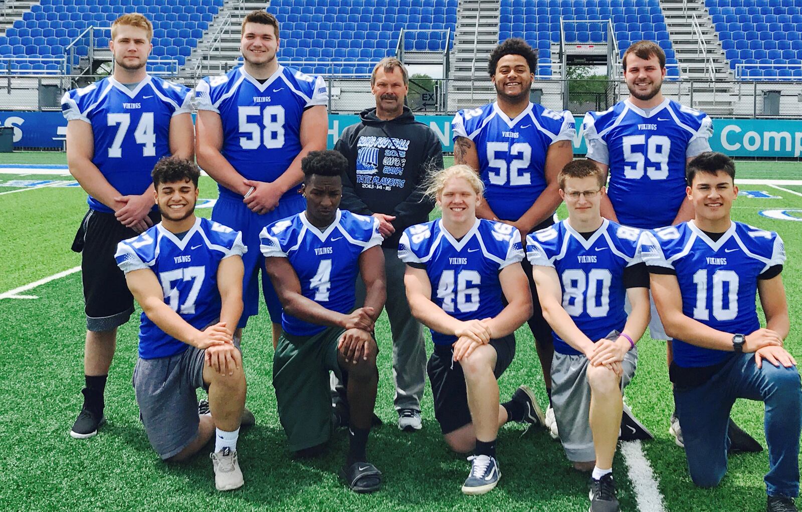 Miamisburg High School seniors and recent grads who will play football at the next level are, front (left): Matt Lauofo (Capital), Julius Wilson (Wittenberg), Jake Neatherton (Ohio), Blake Middleton (Capital) and Mike Lauofo (Capital). Back (left): Cody Lamb (Cincinnati), Josh Myers (Ohio State), Miamisburg coach Steve Channell, Marcus Omosule (Urbana) and Jake Brown (Findlay). CONTRIBUTED PHOTO