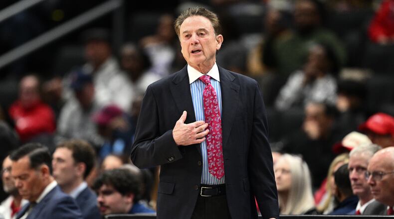 St. John's head coach Rick Pitino gestures during the first half of an NCAA college basketball game against Georgetown, Wednesday, Dec. 31, 2025, in Washington. (AP Photo/Nick Wass)