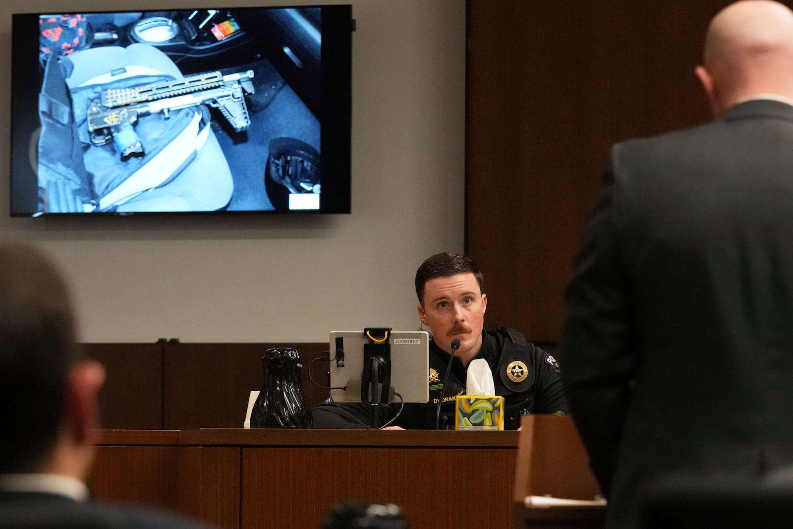 Lake Villa Police Department Sergeant Thomas Dvorak answers a question from Lake County Assistant State's Attorney Ben Dillon during the sentencing hearing for Robert E. Crimo III., at the Lake County Courthouse, in Waukegan, Ill., Wednesday, April 23, 2025. (AP Photo/Nam Y. Huh, Pool)