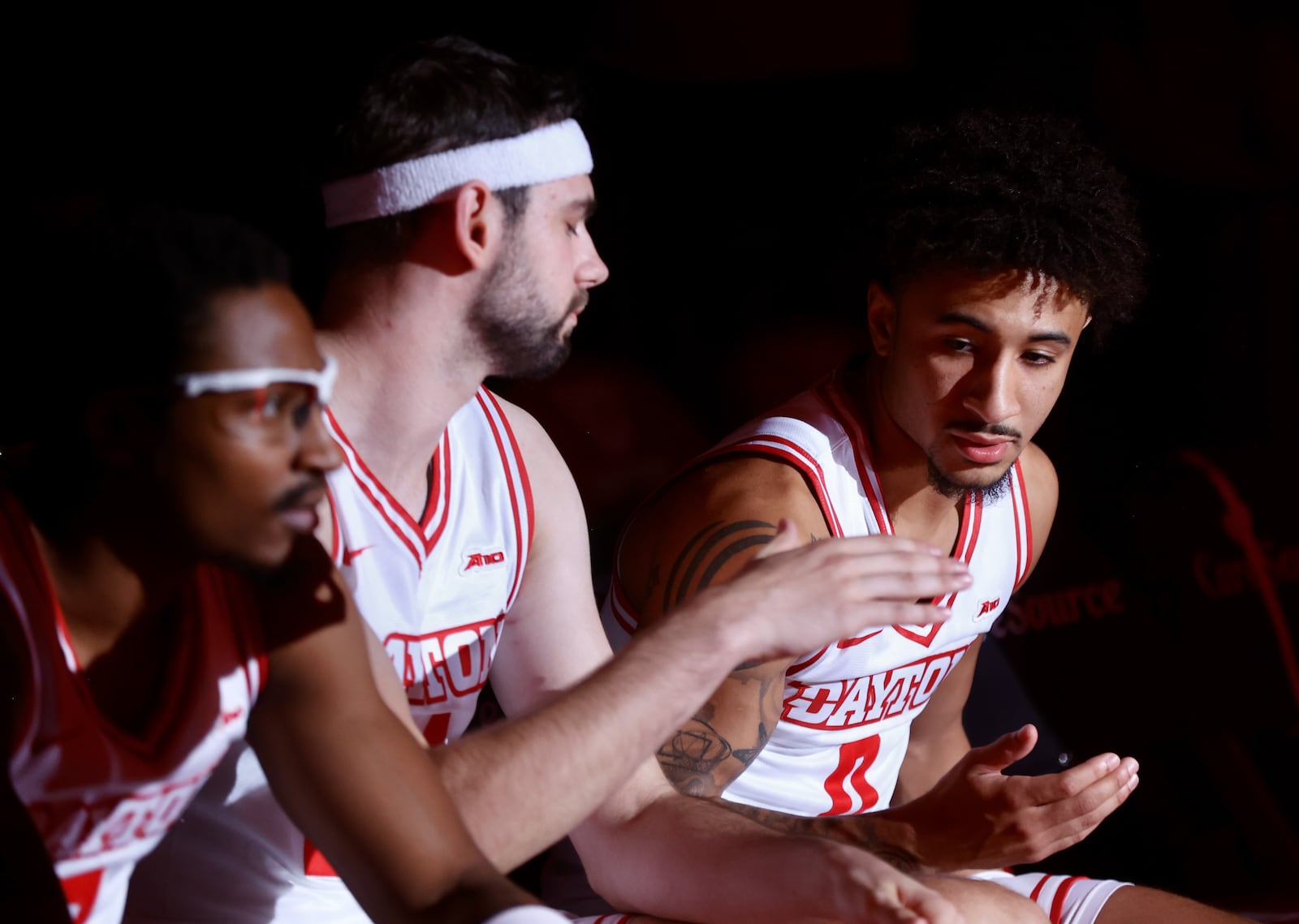 Dayton's Javon Bennett, right, and Jacob Conner slap hands during pregame introductions on Monday, Nov. 3, 2025, at UD Arena. David Jablonski/Staff