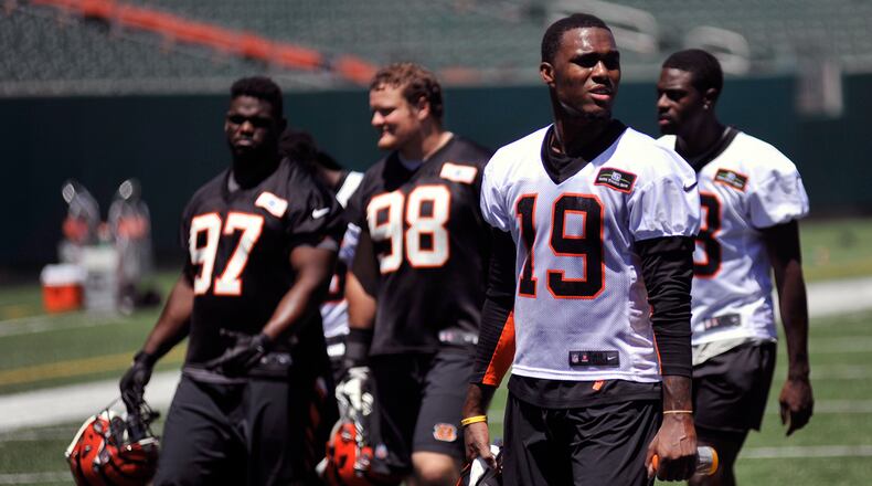 Cincinnati Bengals wide receiver Auden Tate (19) walks off the field following the conclusion of minicamp Thursday at Paul Brown Stadium. JAY MORRISON/STAFF