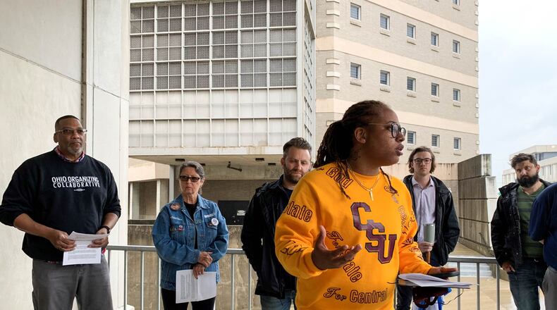 Daj’za Demmings, a member of the Montgomery County Jail Coalition, speaks at a news conference Wednesday outside the jail. CHRIS STEWART / STAFF