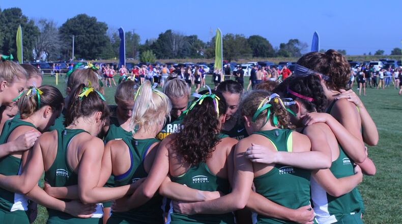 Wright State’s women’s cross country team huddles before the Friendship Invitational earlier this season. Photo courtesy of Wright State