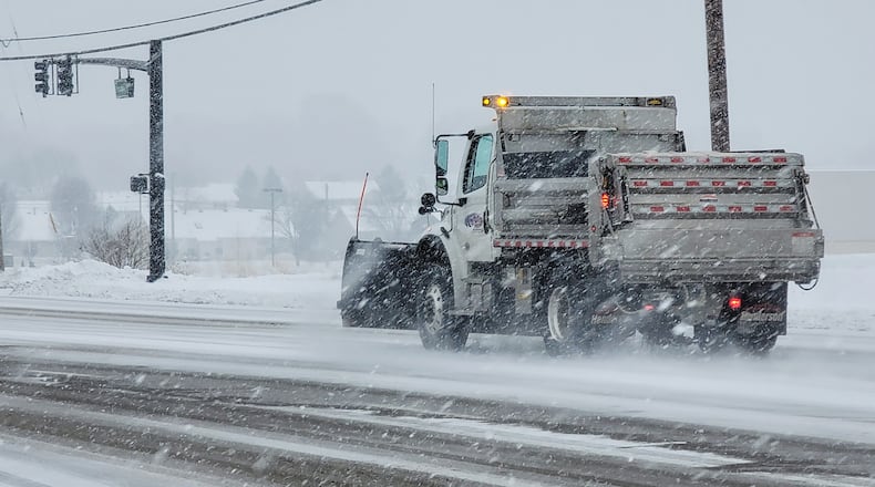 Snow blanketed Butler County causing slick roads and school closings. NICK GRAHAM / STAFF