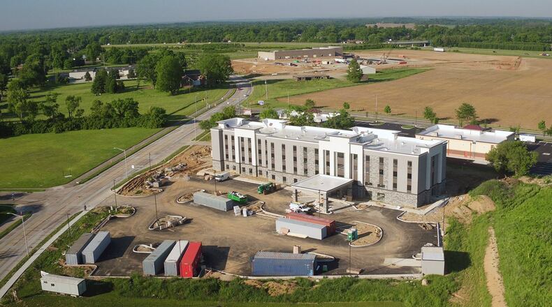 The Hampton Inn and Suites on South Progress Drive in Xenia directly behind two new retail centers including a Penn Station on Hospitality Drive. TY GREENLEES / STAFF
