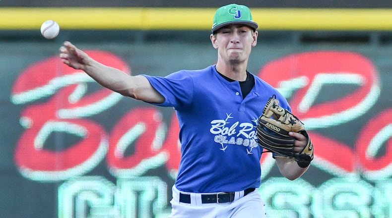 Chaminade Julienne High School shortstop Ryan Peltier throws to first base during the Bob Ross Classic on Saturday night at Fifth Third Field. Peltier hit .337 for the Eagles last season and was first team all-Greater Catholic League Co-Ed. BRYANT BILLING / CONTRIBUTED