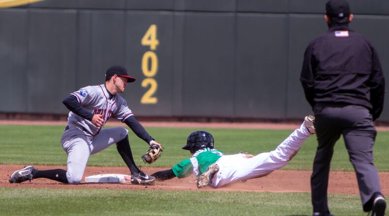 Dayton's Jacob Hurtubise beats the tag by Quad Cities shortstop Nick Loftin in the second inning of Sunday's game at Day Air Ballpark. The steal was Hurtubise's second of the game and 15th of the season. Jeff Gilbert/CONTRIBUTED