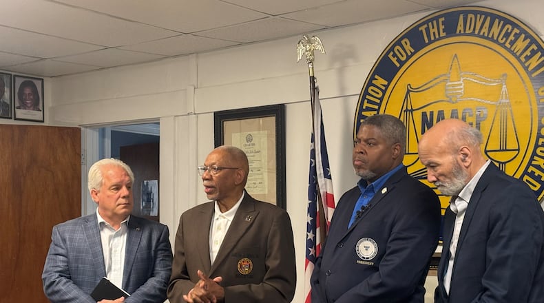 State Rep. Phil Plummer, Dayton mayor Jeffrey Mims, NAACP Dayton unit president Derrick Foward and second vice president Tom Roberts were part of a meeting to discuss busing solutions. Eileen McClory / staff