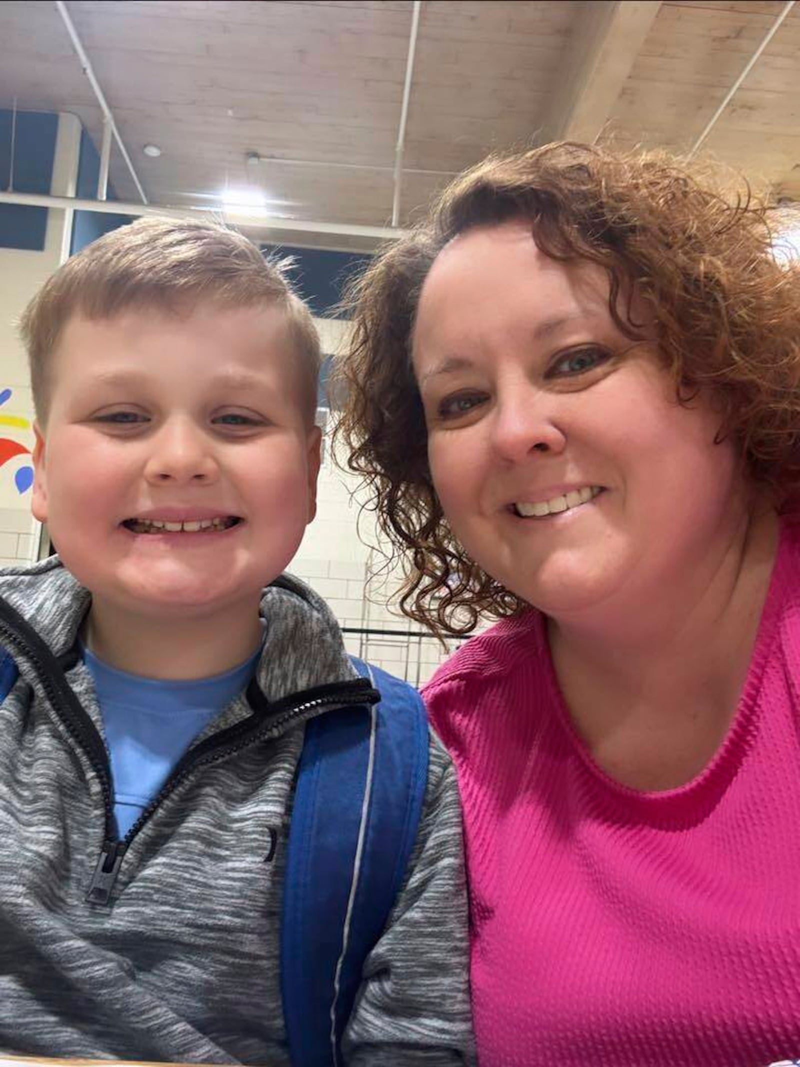 This image provided by Holly LaFavers shows Holly LaFavers posing for a photo with her 8-year-old son Liam Wednesday, April 23, 2025, in Lexington, Ky. (Holly LaFavers via AP)