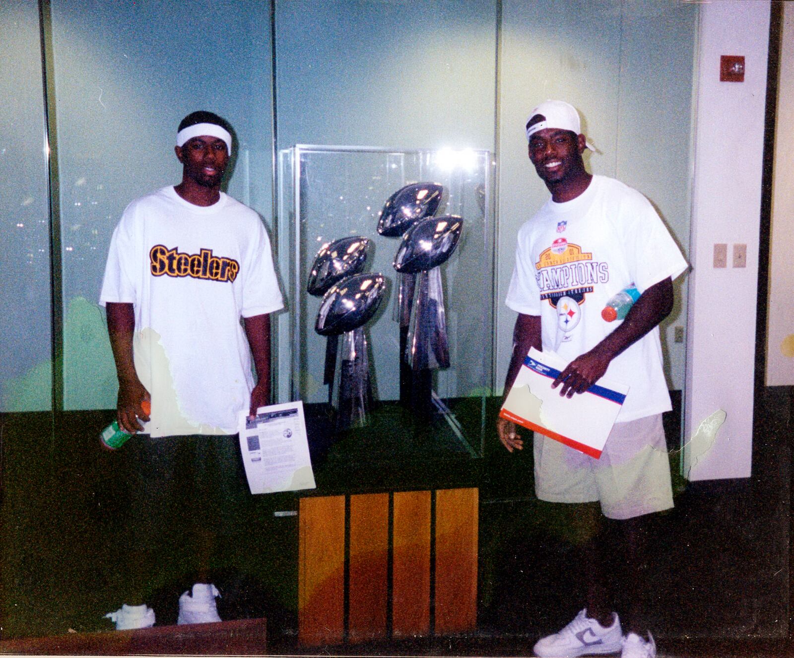 LaVar Glover (right) is picured here in this 2002 photo with his brother James Phillips (left). At the time this photo was taken, Glover had just signed with the Pittsburgh Steelers. The two are standing at the Steelers office in Pittsburgh, PA. Photo submitted by LaVar Glover.