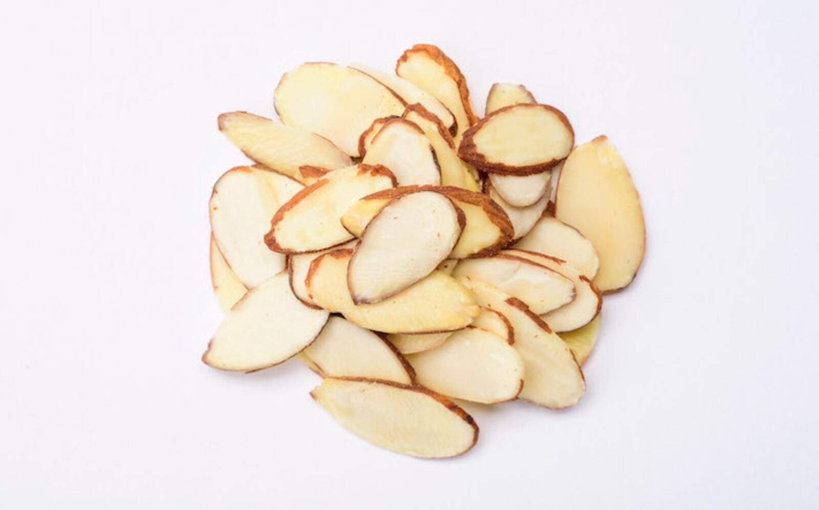 FILE â Sliced almonds, in New York, Jan. 20, 2017. New milks made from everything from coconuts to almonds are allowing home cooks to create richer, more satisfying desserts. (Karsten Moran/The New York Times)
