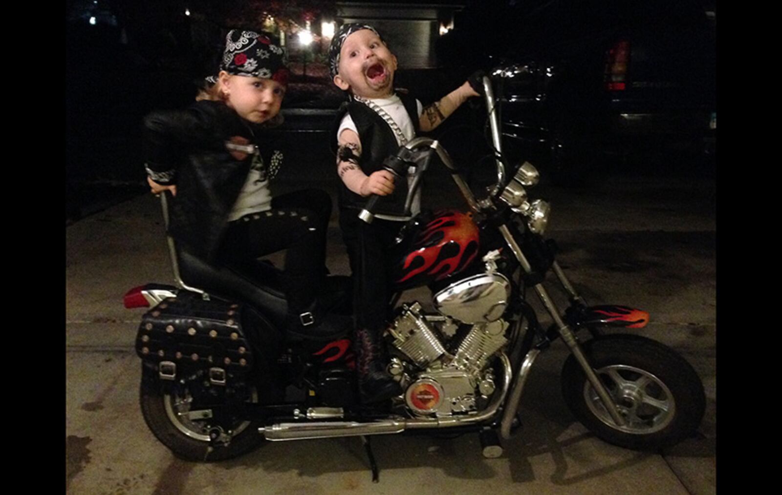After nearly breaking  the Internet last year with their adorable old people costumes, Bellbrook twins Liam and Adelynn Stump are back this Halloween season and this time they are bikers.(Photo courtesy of Bill and Amber Stump)