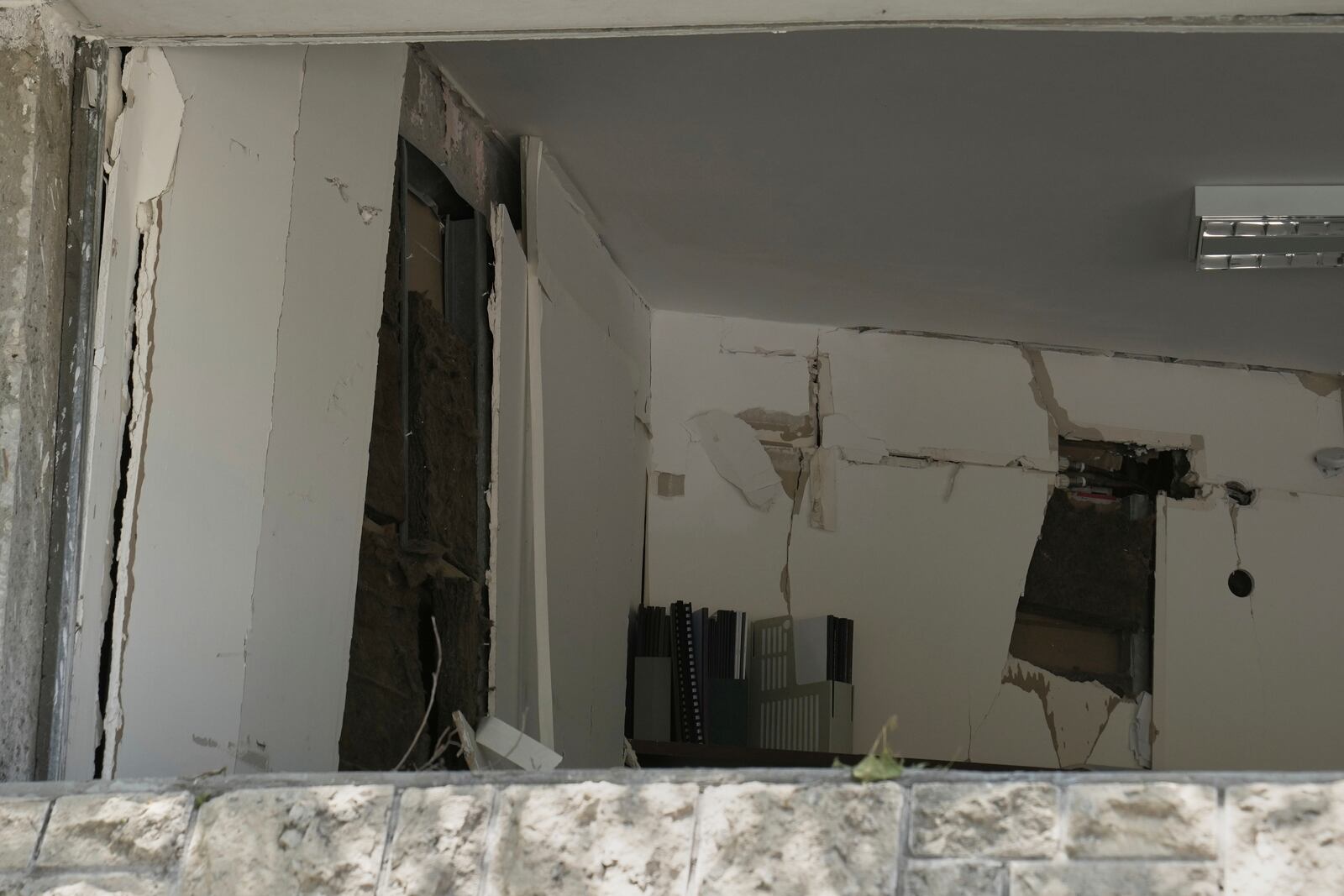 An office inside a building at the Weizmann Institute of Science damaged by an Iranian missile is seen in Rehovot, Thursday, June 19, 2025. (AP Photo/Maya Alleruzzo)