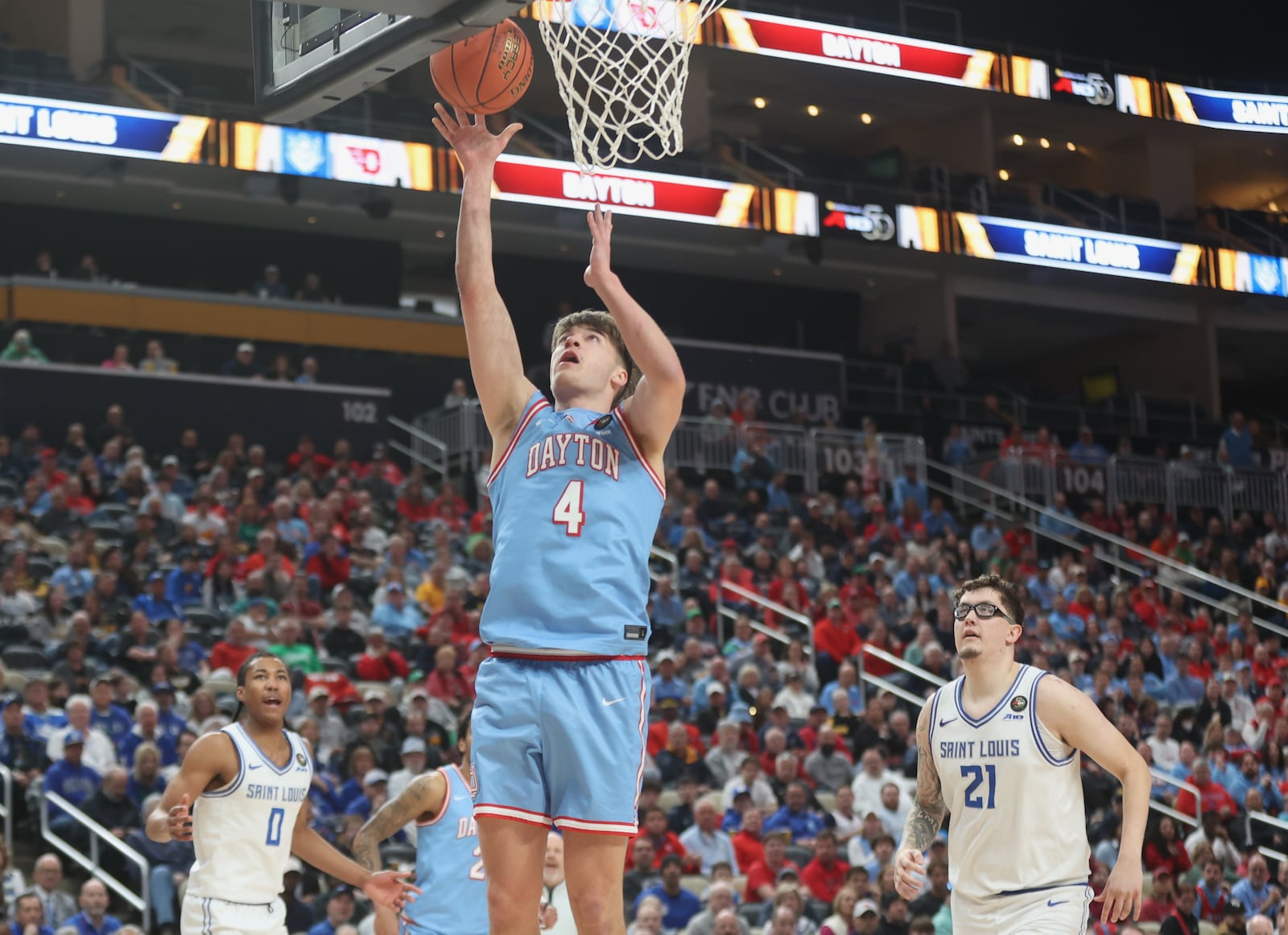 Dayton's Jordan Derkack scores in the first half against Saint Louis in the semifinals of the Atlantic 10 Conference tournament on Saturday, March 14, 2026, at PPG Paints Arena in Pittsburgh. David Jablonski/Staff