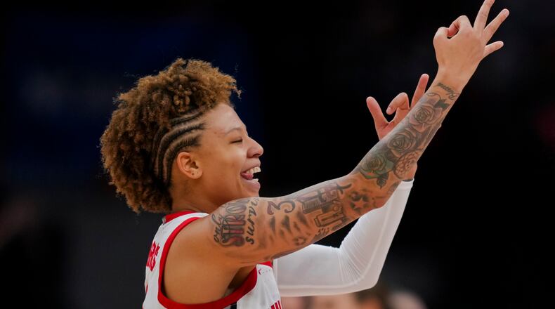 Ohio State guard Rikki Harris reacts to making a 3-point shot during the first half of a first-round college basketball game against Maine in the women's NCAA Tournament, Friday, March 22, 2024, in Columbus, Ohio. (AP Photo/Aaron Doster)