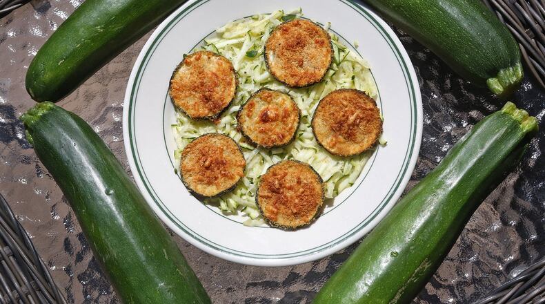 Zucchini Parmesan Crisps float on a bed of shredded zucchini on Wednesday, Aug. 23, 2017, in St. Louis. (J.B. Forbes/St. Louis Post-Dispatch/TNS)
