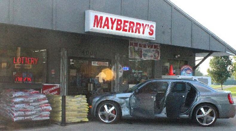 A women crashed the car she was driving into Mayberry's convenience store in Clark County after she was stabbed. JEFF GUERINI/STAFF