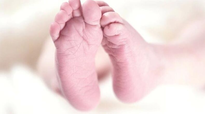 FILE PHOTO: Hospitals celebrated leaplings, the babies born on leap day, in adorable fashion: adorning newborns heads with knitted frog hats.
