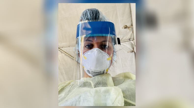 Taylor Schweickart in the PPE gear she wears during one of her shifts swabbing patients at the drive-through COVID-19 testing site set up outside her hospital in Los Angeles. She said some 400 to 600 people a day are being tested at her hospital, which is overflowing with COVID patients. Los Angeles is the new epicenter of the COVID-19 outbreak in the U.S. CONTRIBUTED