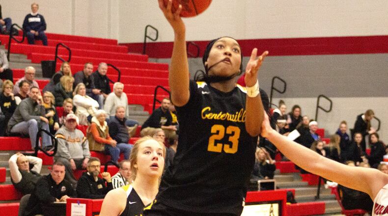 Centerville’s Cotie McMahon scores in the second quarter on the way to the Elks’ dominating victory over Franklin on Thursday in a Division I tournament game at Troy. Jeff Gilbert/CONTRIBUTED