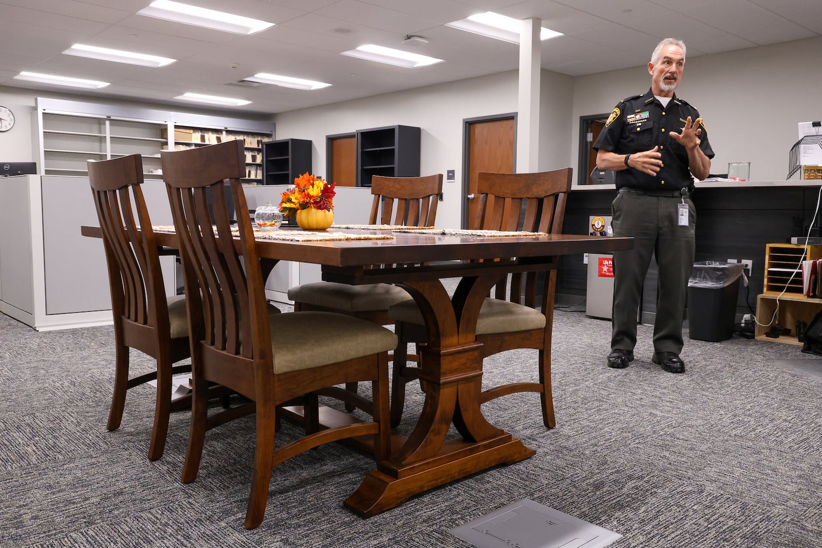 Greene County Sheriff Scott Anger talks in the records room in the new sheriff's office on Monday, Sept. 8. The department moved into its new office on Greene Way Boulevard, just off West Main Street in Xenia, in early August. Much of the furniture in the new office was built by Yutzy Woodworking, an Amish furniture manufacturer in Holmes County. BRYANT BILLING / STAFF