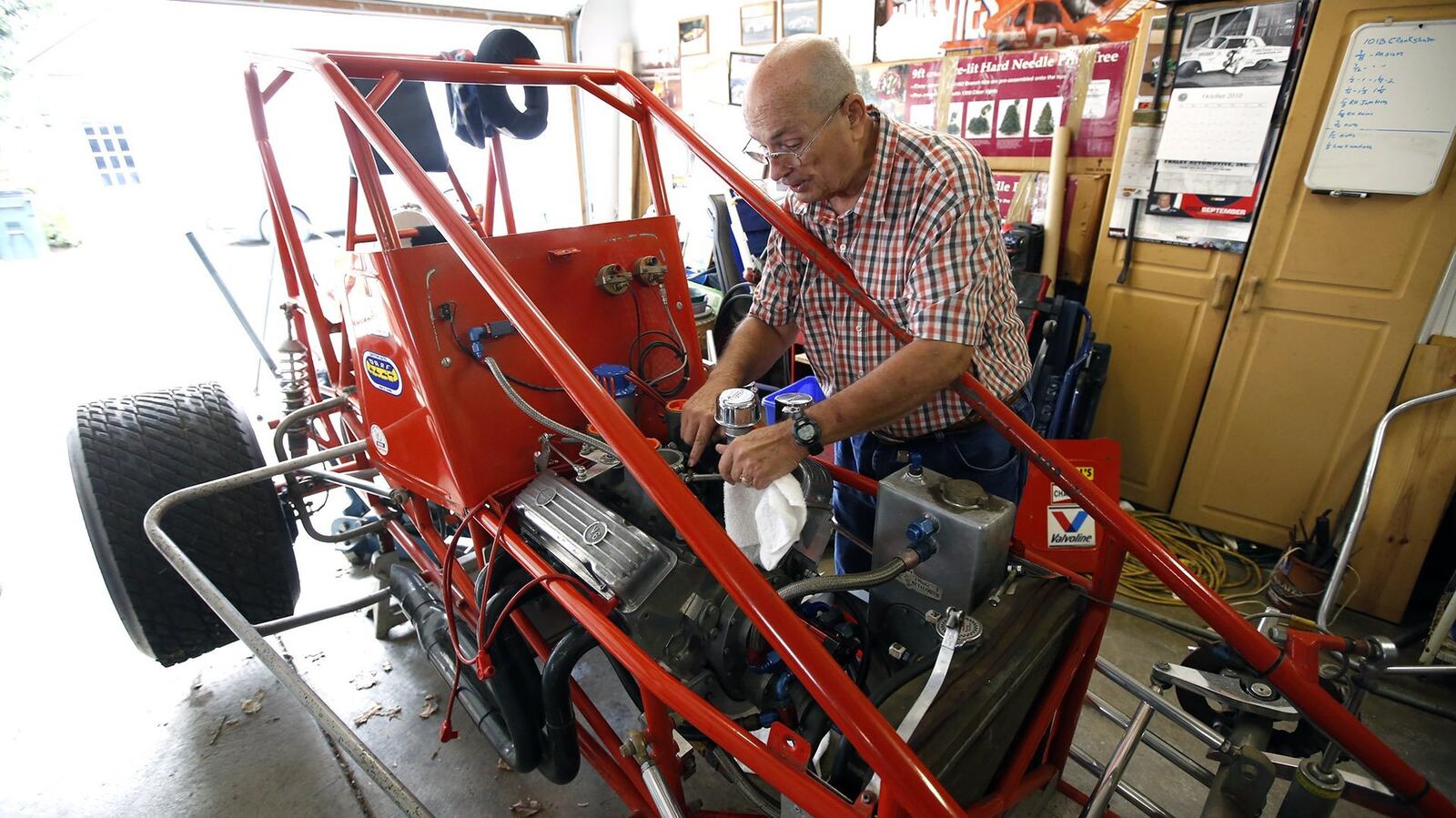 Marvin Goins is finishing the restoration of a Ray Smith sprint car that he started with his late brother John “Pee Wee” Goins in Miamisburg. TY GREENLEES / STAFF