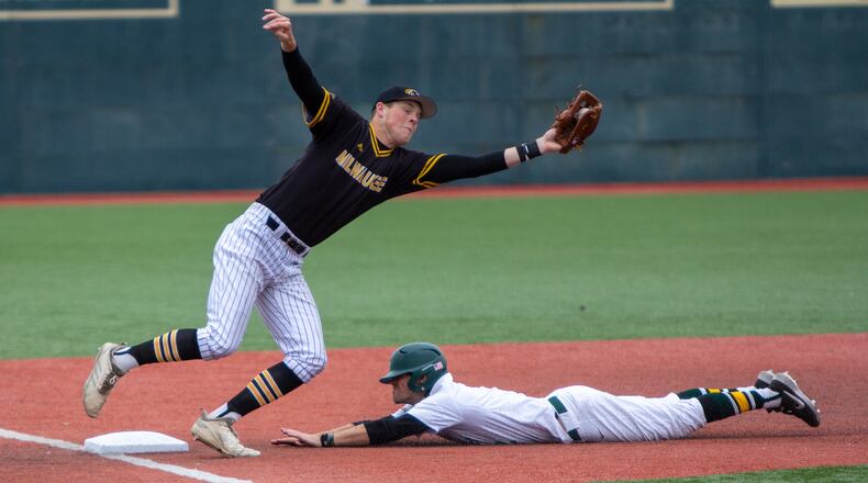 Wright State shortstop Damon Dues steals third base against Milwaukee in the third inning Saturday after hitting a double. Dues homered in fourth to go 4-for-4 with three RBIs, two stolen bases and four runs scored in the first four innings. Jeff Gilbert/CONTRIBUTED
