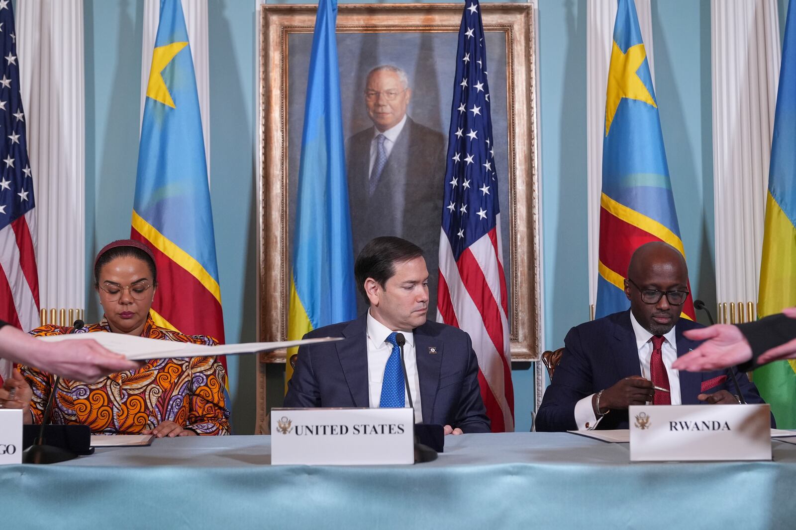 Secretary of State Marco Rubio hosts a Declaration of Principles signing ceremony with Congo's Foreign Minister Therese Kayikwamba Wagner, left, and Rwanda's Foreign Minister Olivier Nduhungirehe, right, Friday, April 25, 2025, at the State Department in Washington. (AP Photo/Jacquelyn Martin)