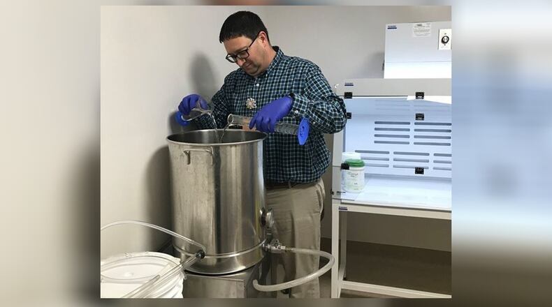 Pharmacists at Dayton Children's Hospital are making hand sanitizer for use in the hospital amid a nationwide shortage due to the coronavirus pandemic. CONTRIBUTED