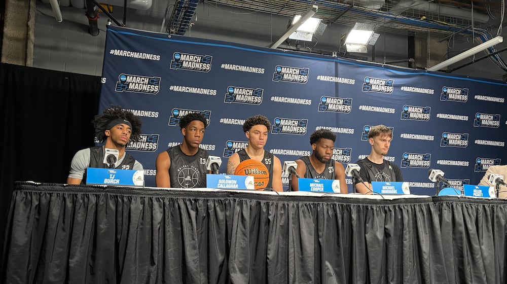 Wright State University players TJ Burch, Solomon Callaghan, Michael Cooper, Michael Imariagbe and Kellen Pickett speak at a press conference on Thursday in Philadelphia. The Raiders will face Virginia in an NCAA First Round game on Friday afternoon. JON MARKS / CONTRIBUTED PHOTO