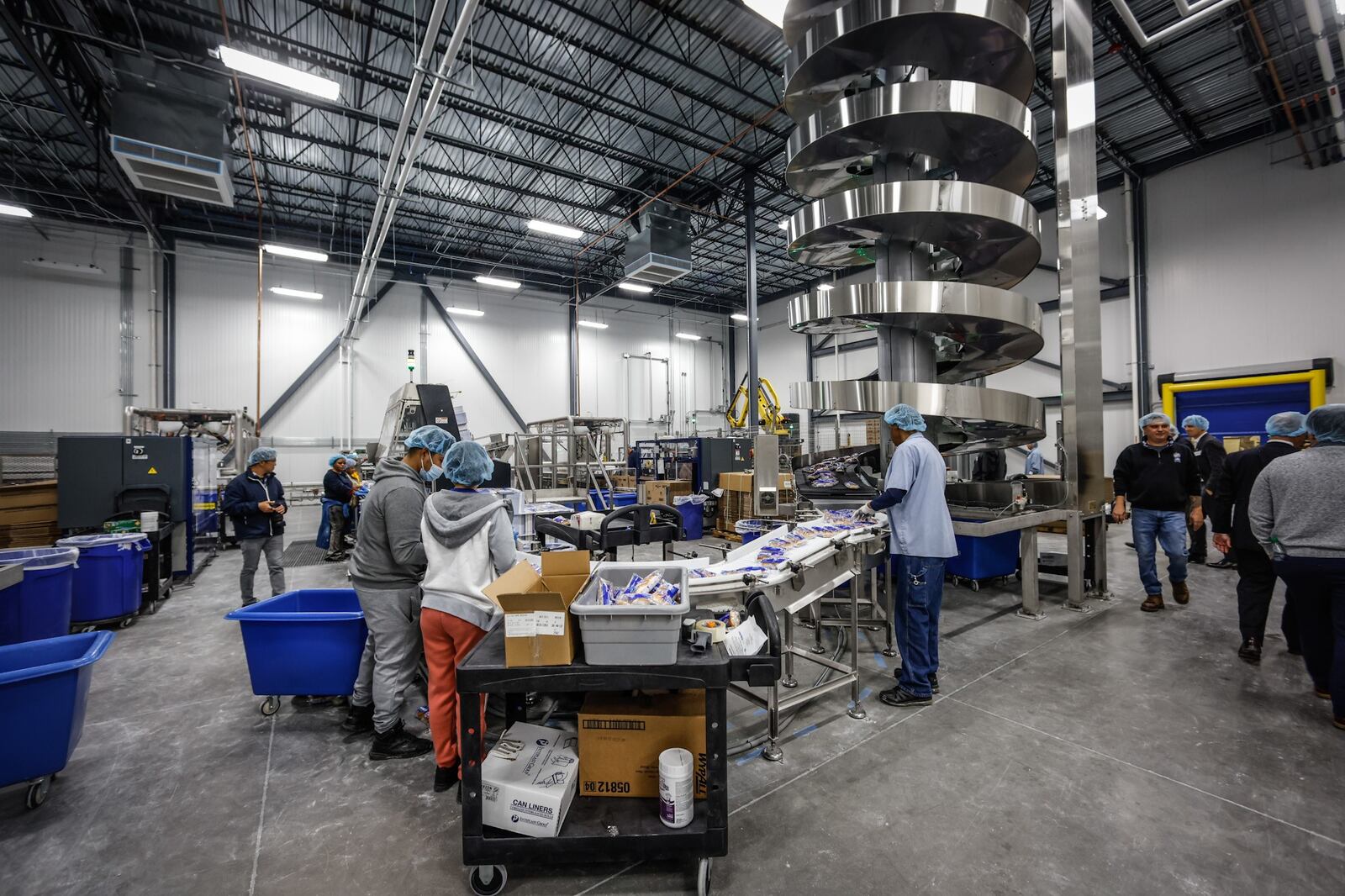 Employees at the White Castle Vandalia plant box up hundreds of thousands of Sliders each day. JIM NOELKER/STAFF