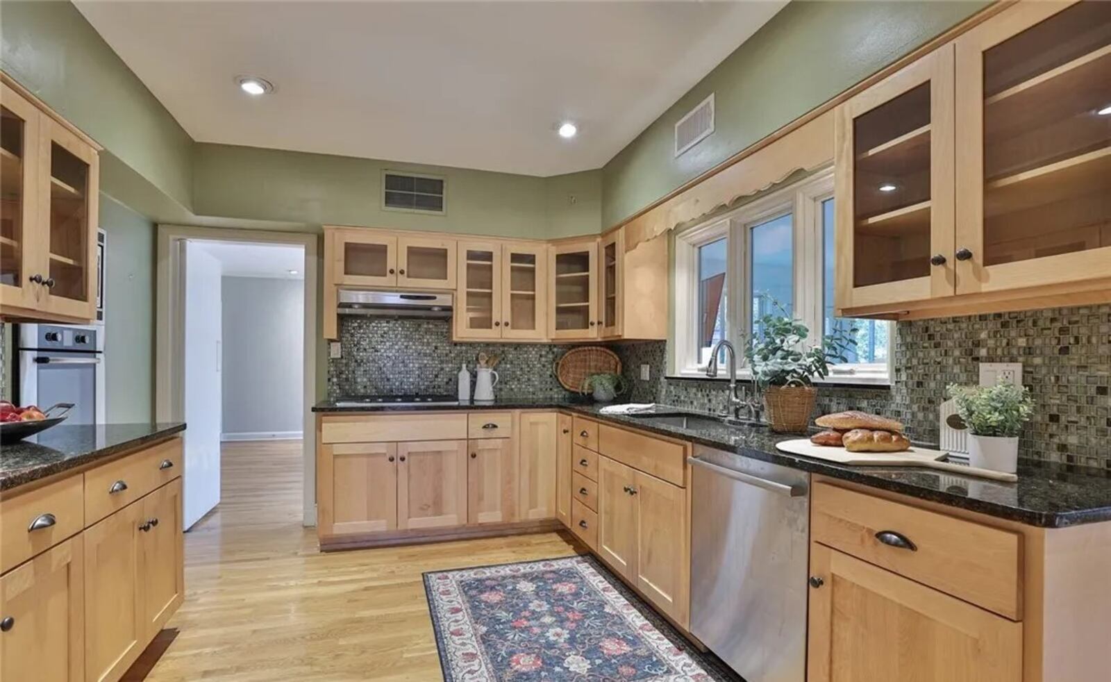 Nestled within an Oakwood tree-lined boulevard, the brick tri-level at 400 E. Schantz Drive has 2,782 square feet of living space. It is listed for $540,000 by Sibcy Cline Realtors. CONTRIBUTED