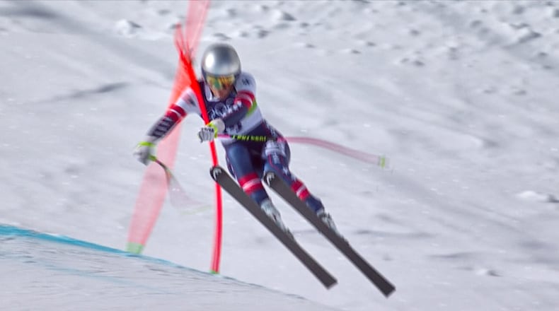 In this image taken from video provided by Olympic Broadcasting Services, OBS, United States' Lindsey Vonn crashes during an alpine ski women's downhill race, at the 2026 Winter Olympics, in Cortina d'Ampezzo, Italy, Sunday, Feb. 8, 2026. (Olympic Broadcasting Services via AP)