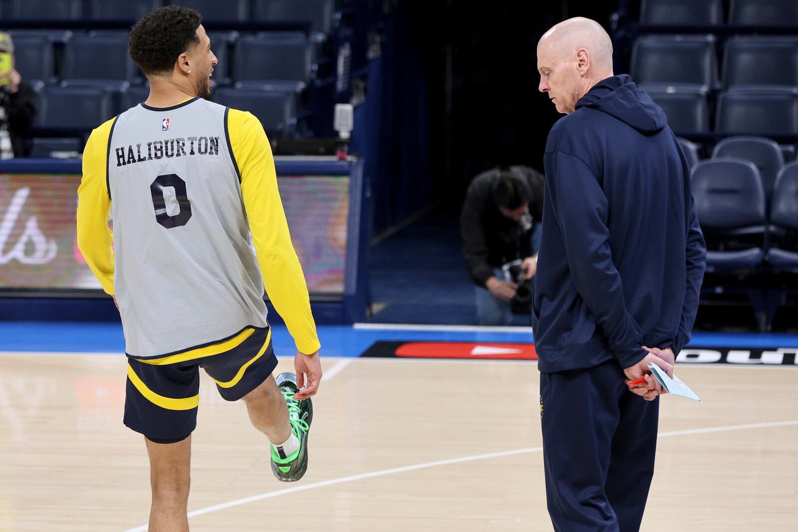 Indiana Pacer coach Rick Carlisle, right, watches guard Tyrese Haliburton (0) stretch during a practice, Wednesday, June 4, 2025, ahead of Game 1 of the NBA Finals basketball series against the Oklahoma City Thunder in Oklahoma City. (AP Photo/Nate Billings)