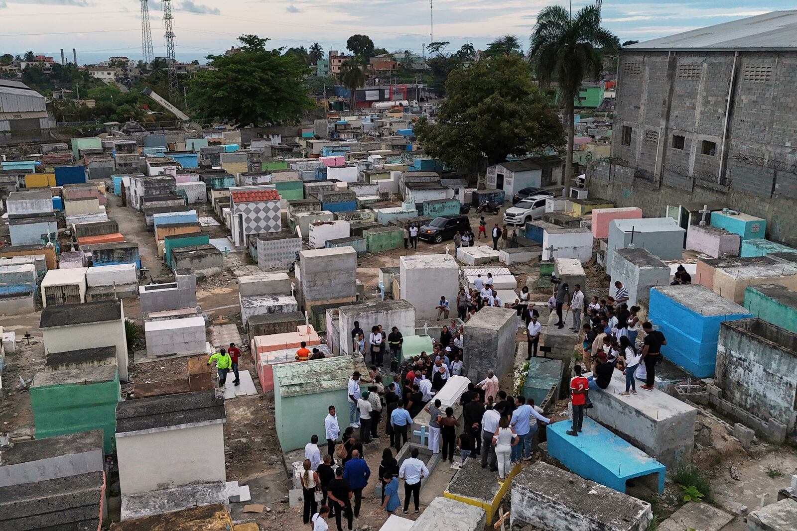 Family and friends attend the burial service for Marilenny Pilarte who died at the Jet Set nightclub when its roof collapsed, in Haina, Dominican Republic, Thursday, April 10, 2025. (AP Photo/Matias Delacroix)