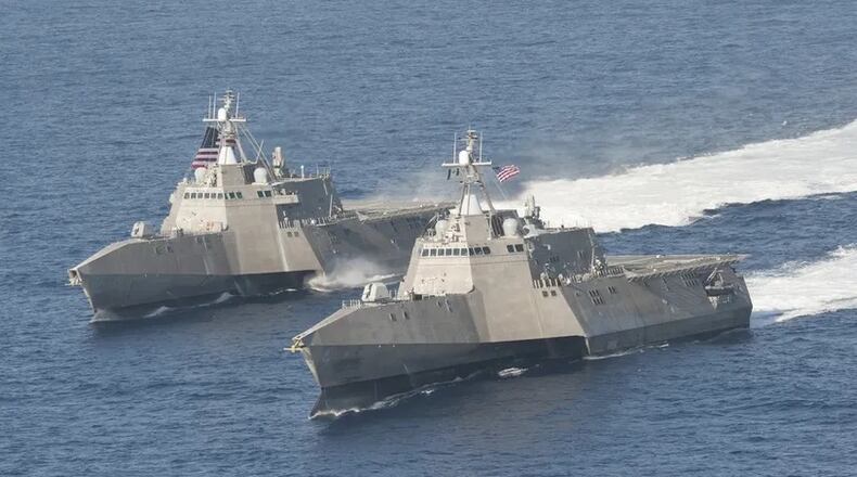 The littoral combat ships USS Independence, left, and USS Coronado are underway in the Pacific Ocean in this 2014 photo. (U.S. Navy photo by Chief Mass Communication Specialist Keith DeVinney)