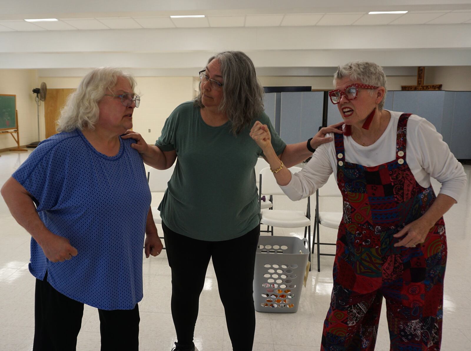 Becky Howard, Kerry Simpson and Pam McGinnis rehearse the Young at Heart Players production of "The Wild Women of Winedale."
Submitted photo.