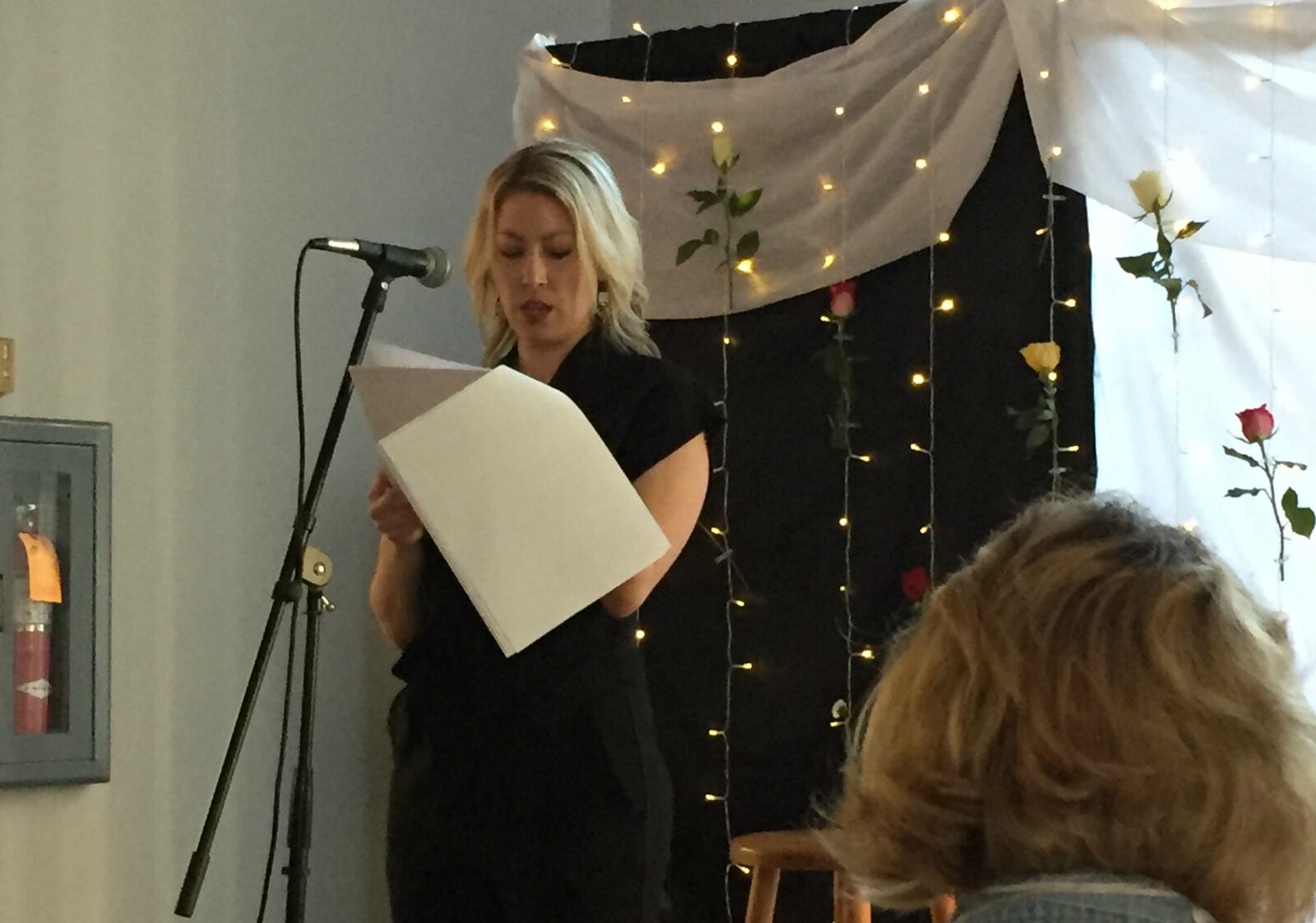 Ashley Bethard reading at Bloom Creative Collective's "Never Sent" event on July 25, 2017. PHOTO / Cory D. D. Miller