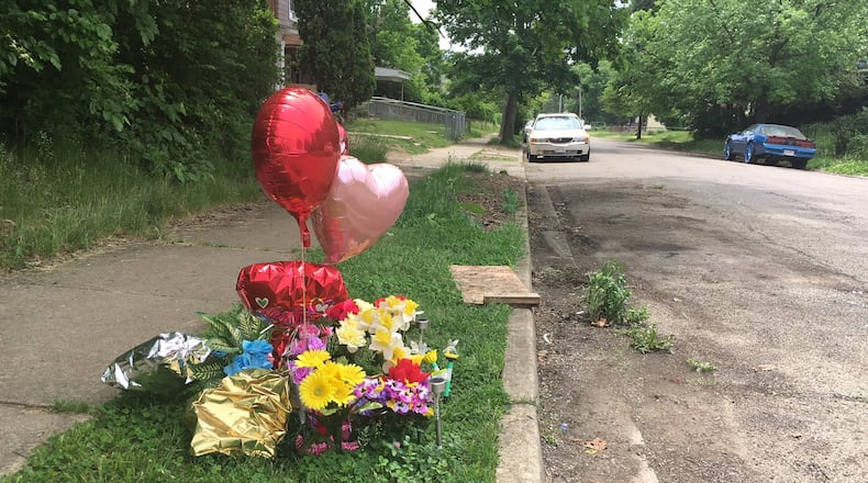 A makeshift memorial was placed near the spot where Sherrell Wheatley was shot on May 19. Wheatey, 62, died at an area hospital. Police say she was an innocent victim and that a drive-by shooter’s bullets were not meant for her.