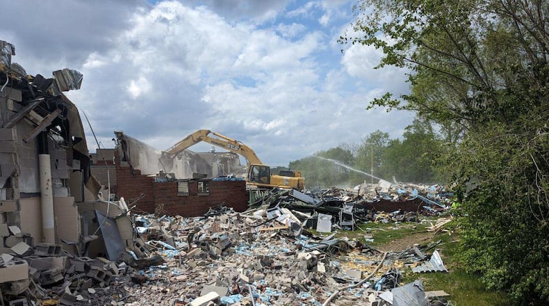 Demolition crews tear down the former Warren County Jail during the spring of 2024 to make room for the new Warren County Court building on the county campus in Lebanon. CONTRIBUTED/WARREN COUNTY
