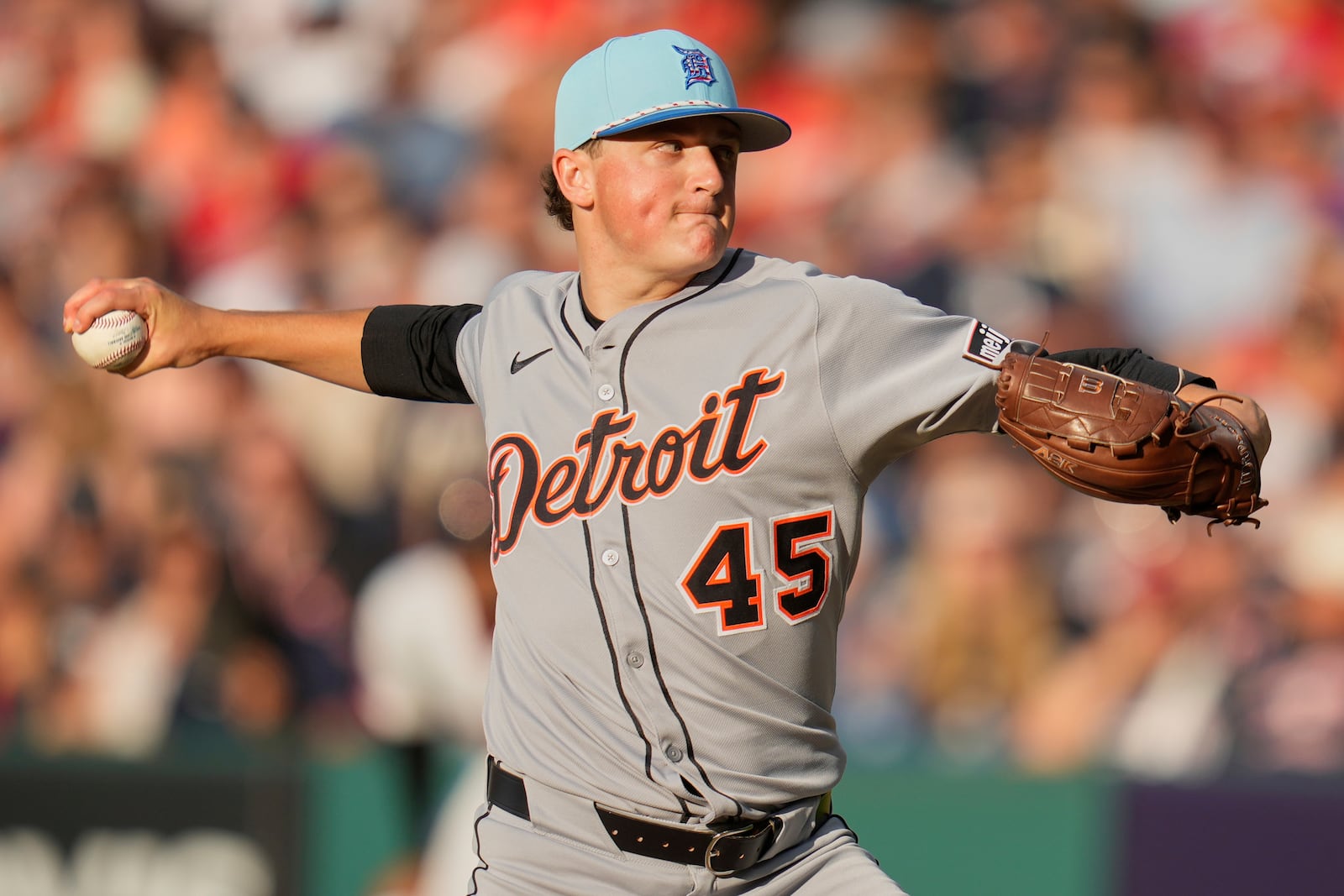 Detroit Tigers' Reese Olson pitches in the first inning of a baseball game against the Cleveland Guardians in Cleveland, Friday, July 4, 2025. (AP Photo/Sue Ogrocki)