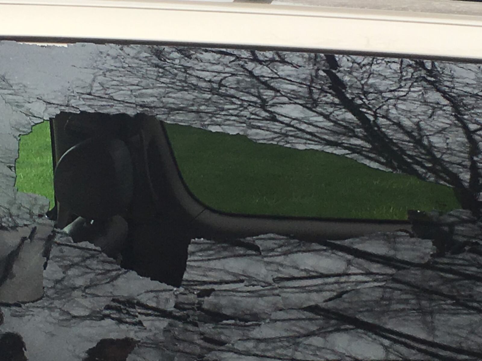 This is where the projectile struck Nicole Miller's minivan. (Mike Campbell/Staff)