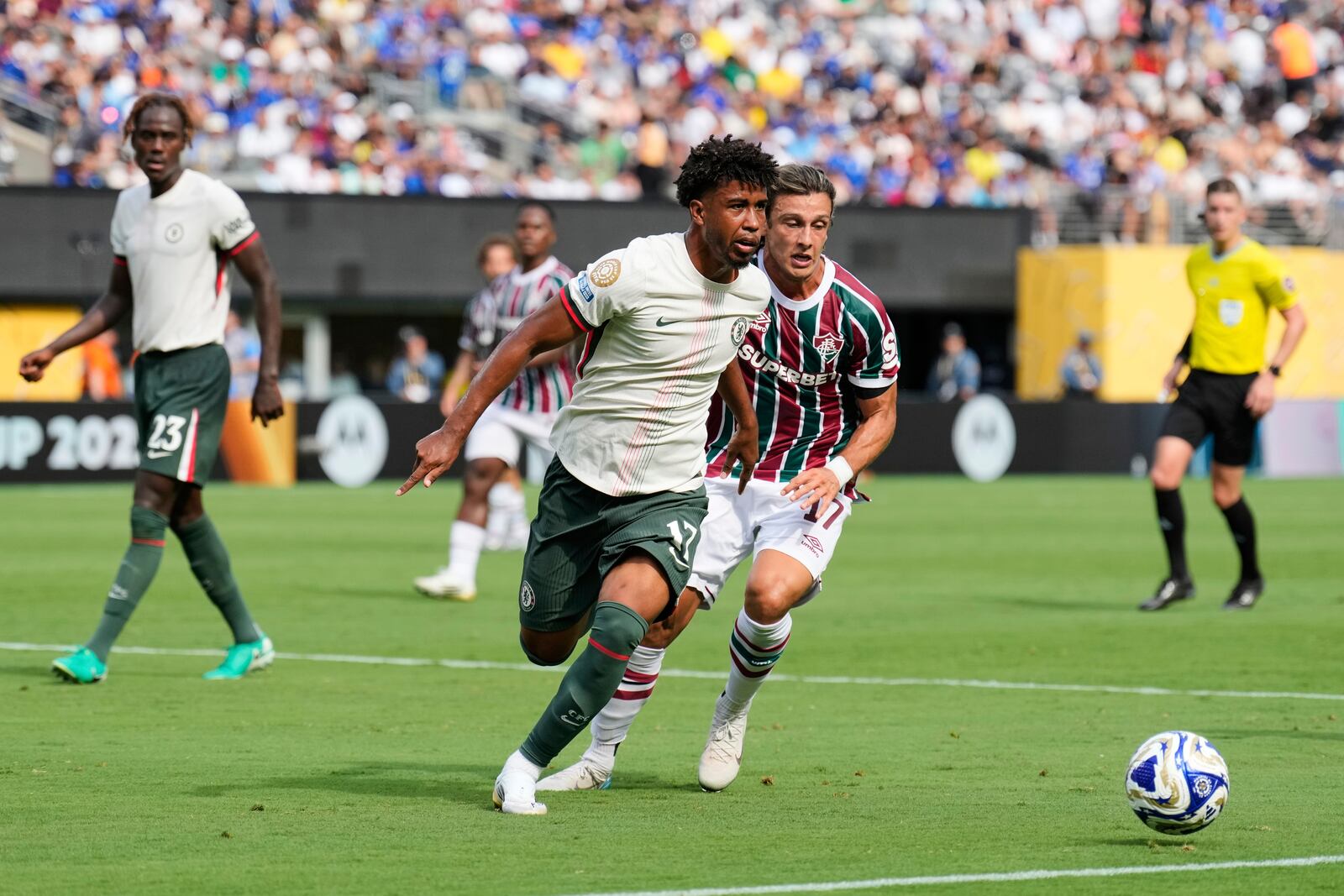 Chelsea's Andrey Santos (17), left, and Fluminense's Agustin Canobbio (17) battle for the ball during the Club World Cup semifinal soccer match between Fluminense and Chelsea in East Rutherford, N.J., Tuesday, July 8, 2025. (AP Photo/Seth Wenig)