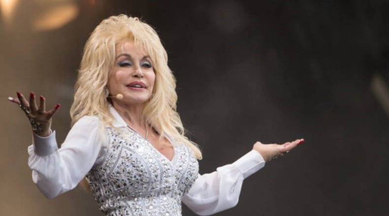 Country singing legend Dolly Parton said she would not mind returning to the cover of Playboy next year for her 75th birthday.