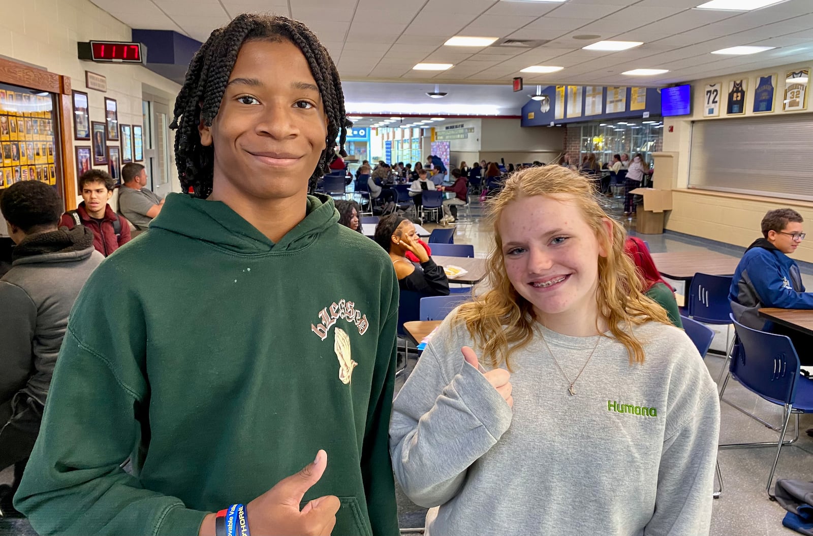 Some Monroe High School students were recently invited to pause from their busy school day, step up to a microphone and video camera and simply share something good that happened to them during their classes. The teens’ open-hearted and positive responses were captured on video and then posted on Monroe Schools’ social media and has since gone viral nationally, having just been featured on NBC TV’s “Today Show” for an audience of millions. Pictured are two of the students in the video: Robbie Merriweather and Kearstyn Rosenbalm. (Photo By Michael D. Clark/Journal-News)