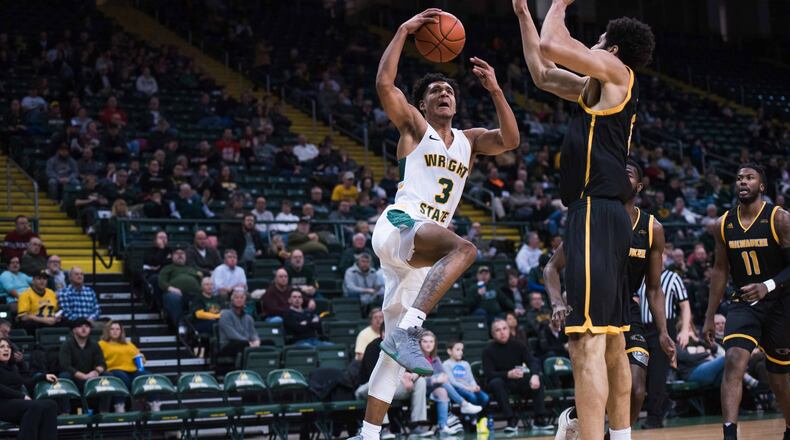 Wright State’s Mark Hughes goes up for a shot against Milwaukee on Jan. 24, 2019, at the Nutter Center. Joseph Craven/CONTRIBUTED