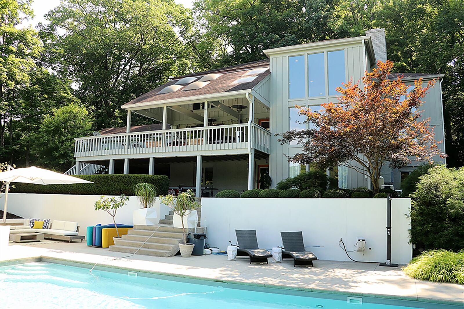 The 20-by-40 saltwater pool was built by Buckeye Pools. The pool ranges in depth from 4 feet to 9 feet from the diving board to the shallow end. The Hot Springs hot tub on the upper deck conveys with the new owners. Skylights allow natural light onto the covered deck. CONTRIBUTED PHOTO